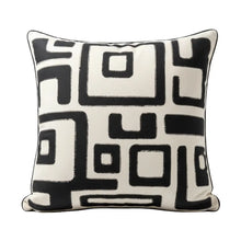 Load image into Gallery viewer, Decorative pillow with black geometric pattern on a white background