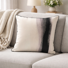 Load image into Gallery viewer, Decorative pillow with watercolor design on a gray sofa in a living room setting.