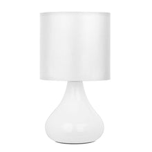 Load image into Gallery viewer, White table lamp with a round shade on a white background
