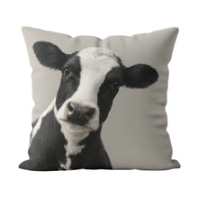 Load image into Gallery viewer, Pillow with a cow face design on a gray background