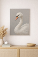 Load image into Gallery viewer, Framed artwork of a swan on a wall above a wooden cabinet with decorative items.