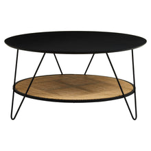 Load image into Gallery viewer, Round black coffee table with a woven shelf on a white background