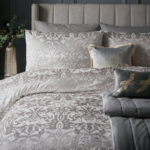 Load image into Gallery viewer, Gray patterned bedding set on a bed with decorative pillows.