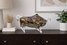 Load image into Gallery viewer, Decorative marbled sculpture on a wooden surface with a lamp and plant in the background.