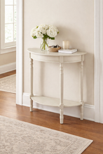 Load image into Gallery viewer, White console table with a vase of flowers, books, and a candle in a room with wooden flooring and a window.