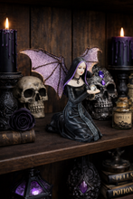 Load image into Gallery viewer, Gothic figurine with bat wings and candles on a dark wooden shelf