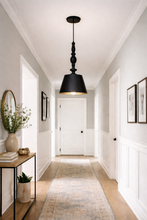 Load image into Gallery viewer, Modern hallway with a black pendant light, white walls, and a wooden floor.