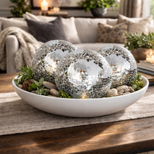Load image into Gallery viewer, Decorative glass spheres with pebbles and plants in a white bowl on a wooden table.