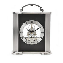 Load image into Gallery viewer, Silver clock with black face on a white background