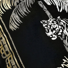 Load image into Gallery viewer, Black fabric with white tiger design and gold patterns