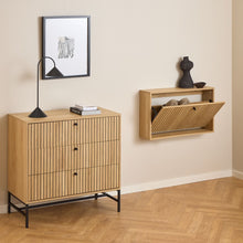 Load image into Gallery viewer, Wooden cabinet and wall-mounted shelf against a beige wall with a framed picture.
