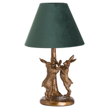 Load image into Gallery viewer, Decorative table lamp with bronze rabbit figures and a green lampshade on a white background
