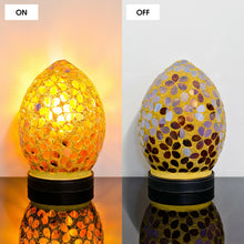 Load image into Gallery viewer, Egg-shaped mosaic lamp shown on and off with a gradient background.
