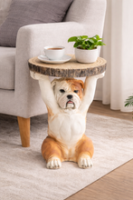 Load image into Gallery viewer, Bulldog-shaped side table with a cup and plant in a living room setting

