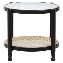 Load image into Gallery viewer, Round side table with black frame and glass top on a white background
