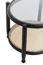 Load image into Gallery viewer, Round side table with black metal frame and glass top on a white background
