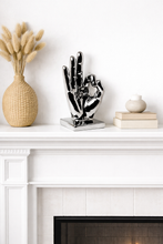 Load image into Gallery viewer, Decorative mantel with a vase, sculpture, and books on a white fireplace.
