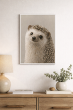 Load image into Gallery viewer, Framed artwork of a hedgehog on a wall above a wooden console table with decor items.
