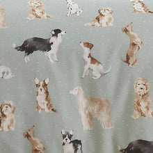 Load image into Gallery viewer, Pattern of dogs on a fabric with a light green background
