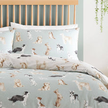 Load image into Gallery viewer, Dog-patterned bedding set on a bed with a wooden headboard.

