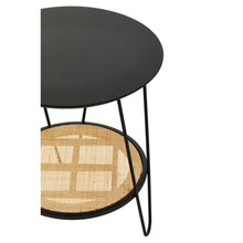 Load image into Gallery viewer, Round side table with black metal frame and woven rattan seat on a white background

