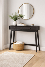 Load image into Gallery viewer, Black console table with a round mirror, plant, and basket in a room.
