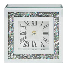 Load image into Gallery viewer, A square decorative clock with a white face, black Roman numerals, and a border of iridescent rhinestones on a white frame.
