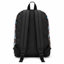 Load image into Gallery viewer, The back view of a black backpack with adjustable shoulder straps and a brown side panel featuring a light blue pattern, shown on a white background.
