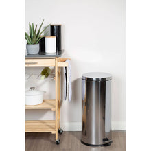 Load image into Gallery viewer, Stainless steel trash can next to a wooden cart with kitchen items in a room.
