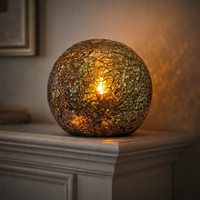 Load image into Gallery viewer, Mosaic glass lamp on a mantelpiece with warm glow

