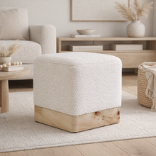Load image into Gallery viewer, White textured ottoman with wooden base in a living room setting
