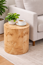 Load image into Gallery viewer, Wooden side table with a plant and cup of coffee in a living room setting
