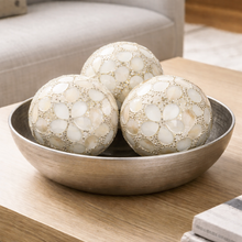 Load image into Gallery viewer, Decorative spherical objects in a bowl on a wooden surface
