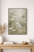 Load image into Gallery viewer, Framed artwork of a floral scene on a wall above a wooden console table.
