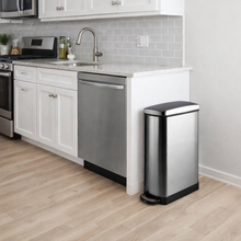 Load image into Gallery viewer, Stainless steel trash can in a modern kitchen setting
