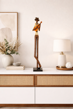 Load image into Gallery viewer, Decorative statue on a white console table with a lamp and framed artwork in the background.
