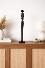 Load image into Gallery viewer, Decorative statue on a wooden cabinet with a white wall background
