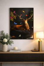 Load image into Gallery viewer, Framed artwork of a deer with flowers on a wall above a wooden console table.
