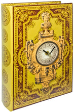 Load image into Gallery viewer, Decorative book with clock design on a yellow background
