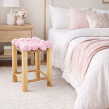 Load image into Gallery viewer, Wooden stool with pink floral cushion in a bedroom setting
